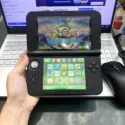 Nintendo 3DS LL xanh cũ hai màn hình bật