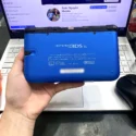 Nintendo 3DS LL xanh cũ mặt lưng