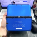 Nintendo 3DS LL xanh cũ mặt lưng khi gập