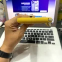 Nintendo Switch Lite vàng cũ cạnh bên