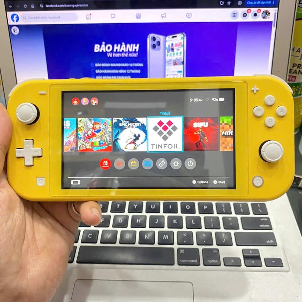 nintendo-switch-lite-vang-cu-da-mob-man-hinh-game Nintendo Switch Lite vàng cũ đã mob màn hình đầy game