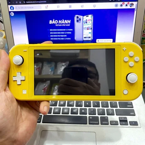 nintendo-switch-lite-vang-cu-mat-truoc Nintendo Switch Lite vàng cũ mặt trước
