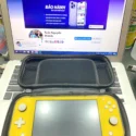 Nintendo Switch Lite vàng cũ kèm túi đựng