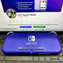Nintendo Switch Lite xanh cũ logo mặt lưng