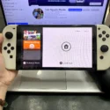 Nintendo Switch OLED trắng cũ màn hình bật